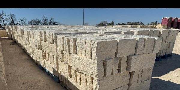Rows of palletized chop building stone