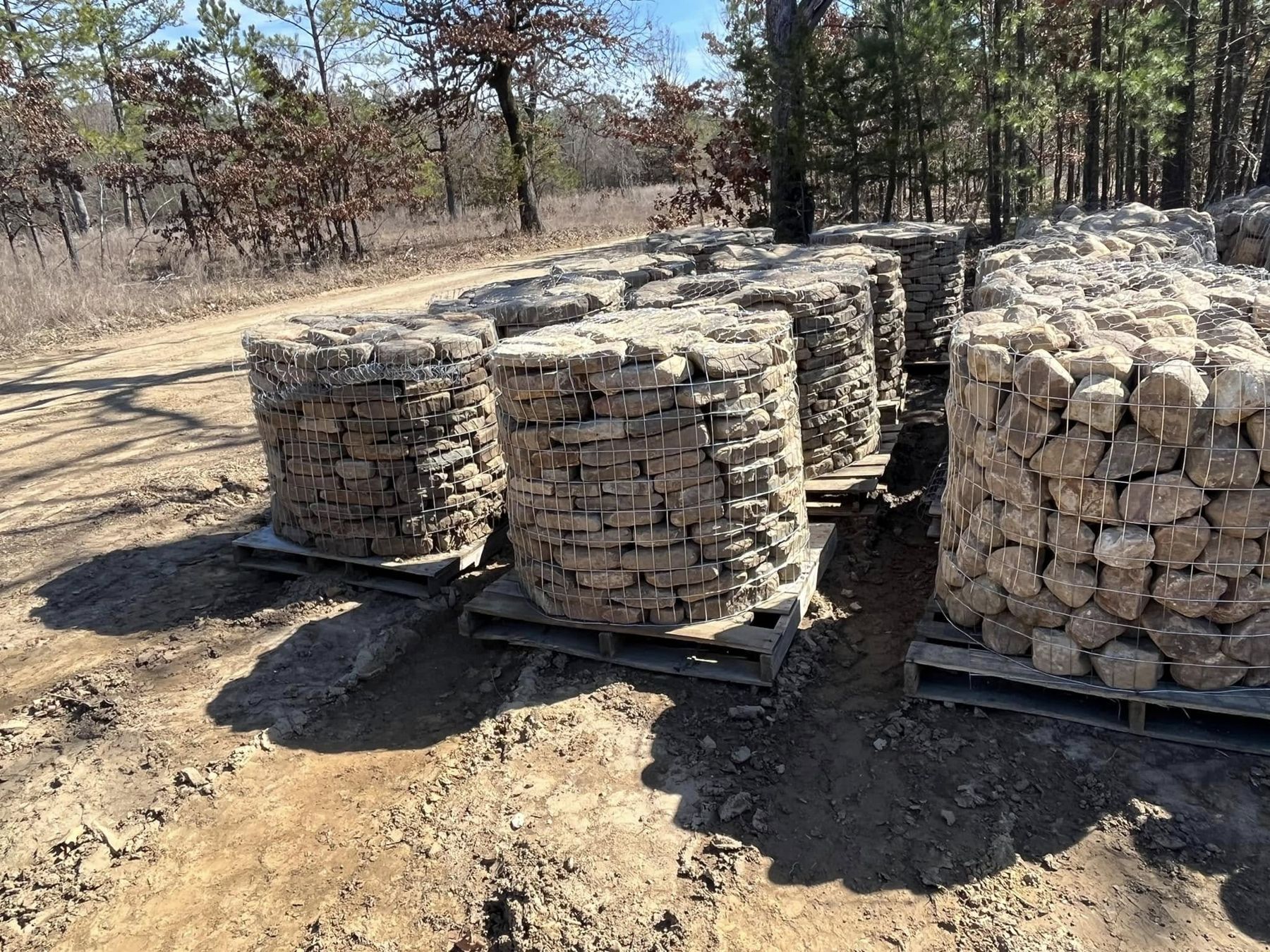 Caged pallets of Oklahoma river and creek boulders