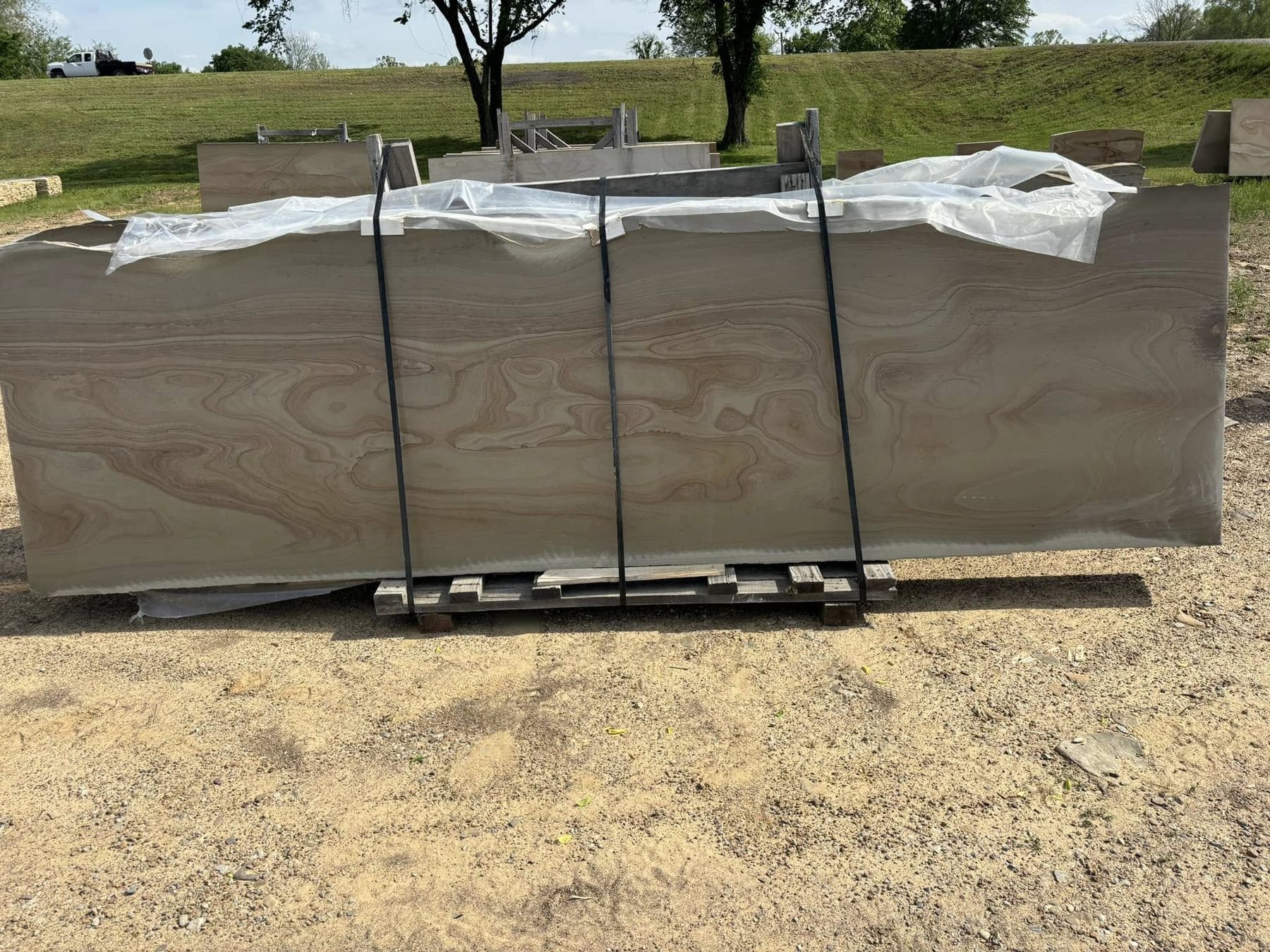 Large sawn sandstone slab crated for shipping